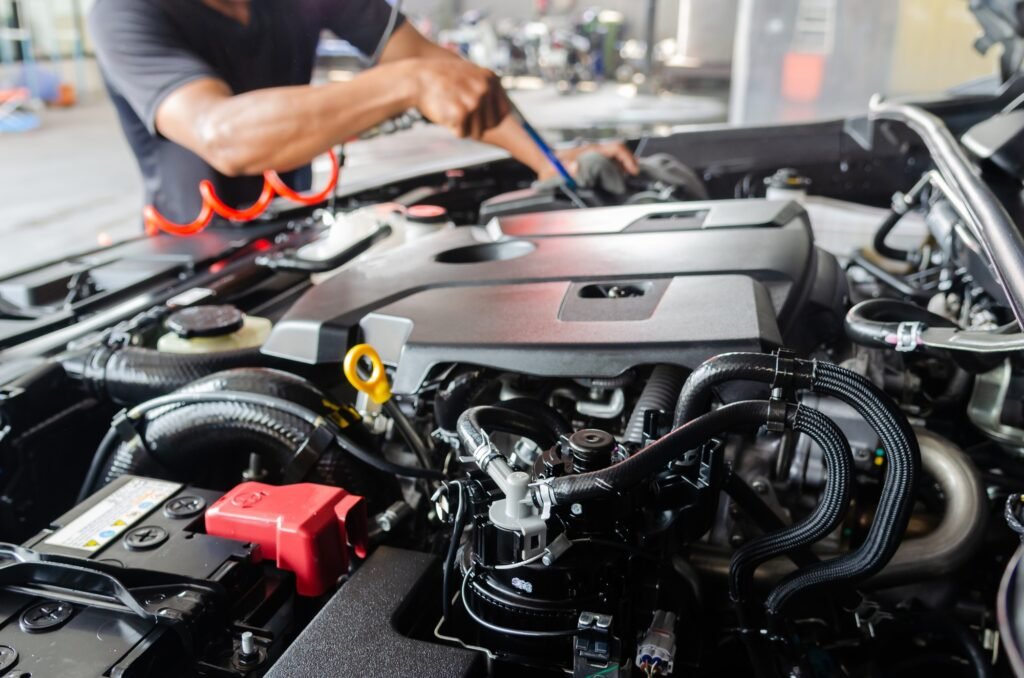 Process of cleaning the engine of a car with a spray